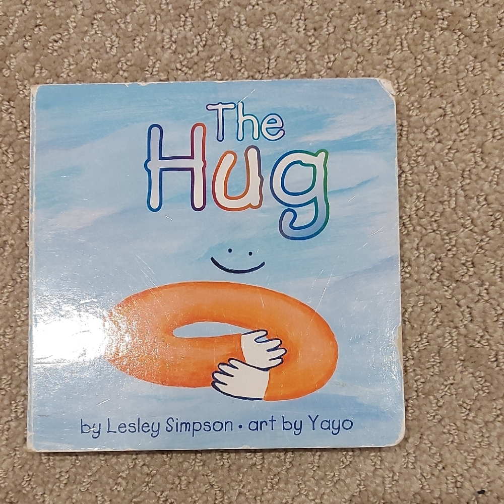 The Hug Board Book by Lesley Simpson - Blue & Orange Cover
